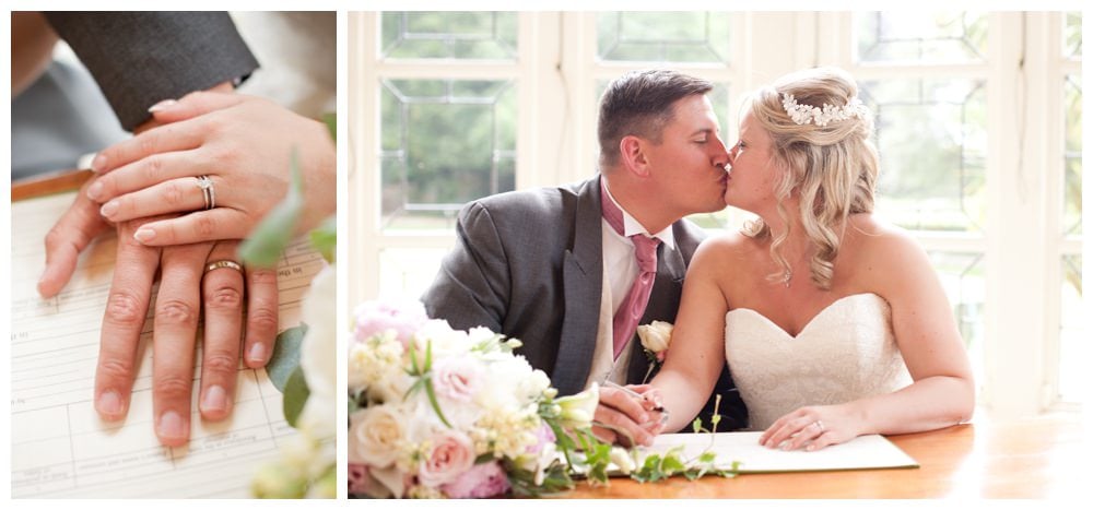 Happy couple signing the register at Highcliffe Wedding