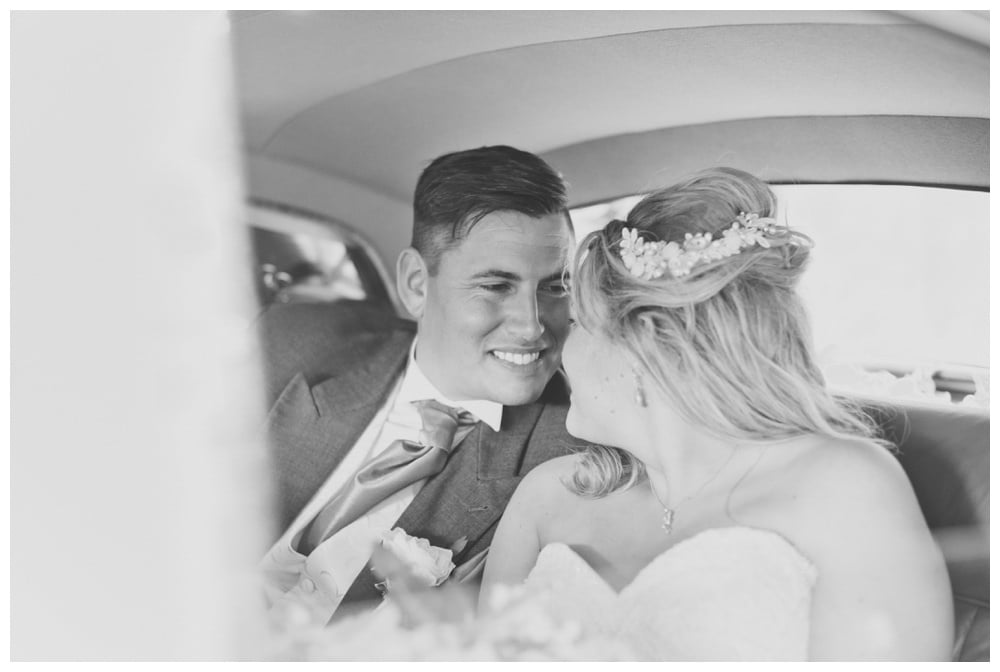 Bride and groom in Rolls Royce
