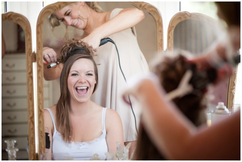 Ringwood Bride laughing with hairdresser on wedding day