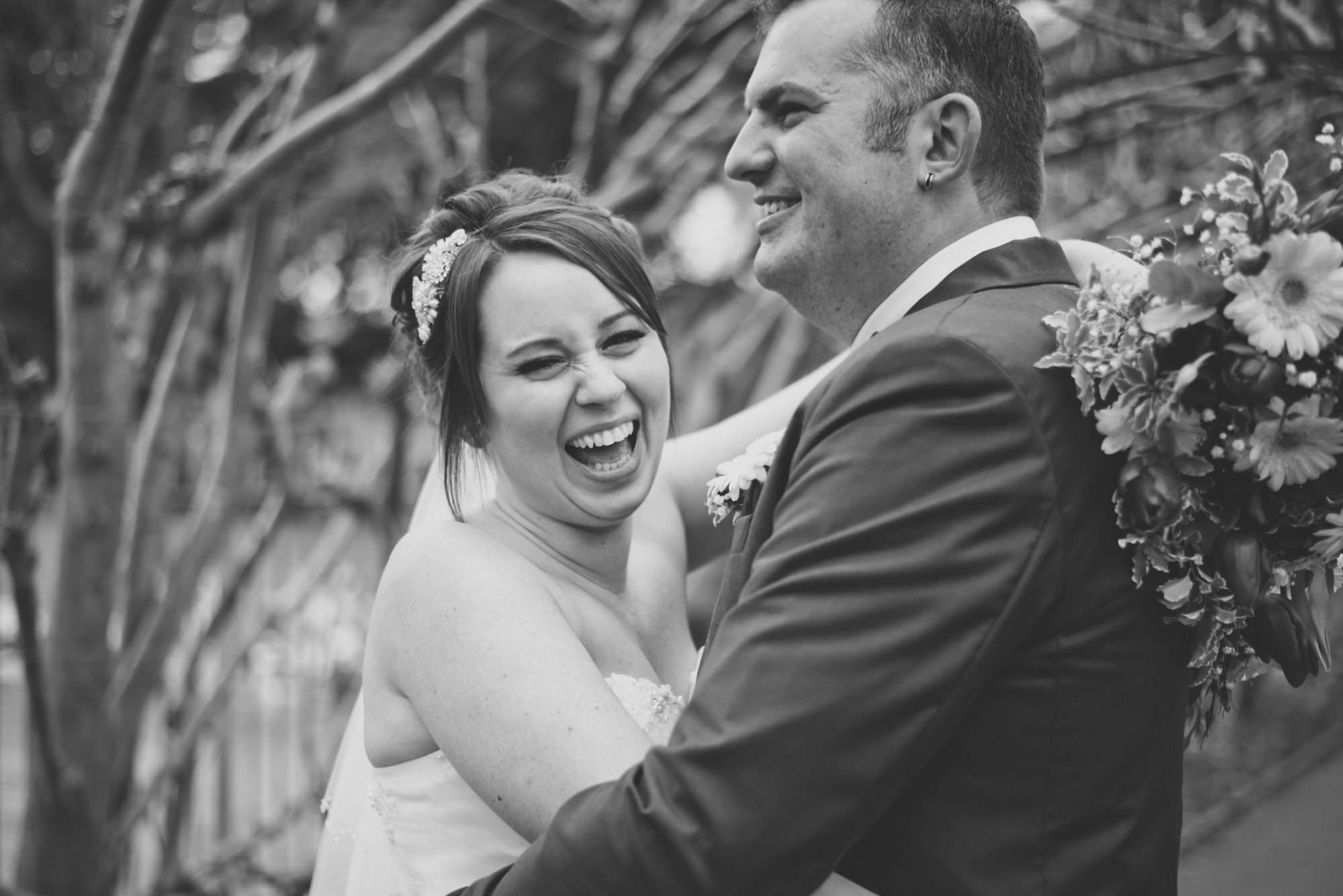 Bride laughing at Christchurch Wedding