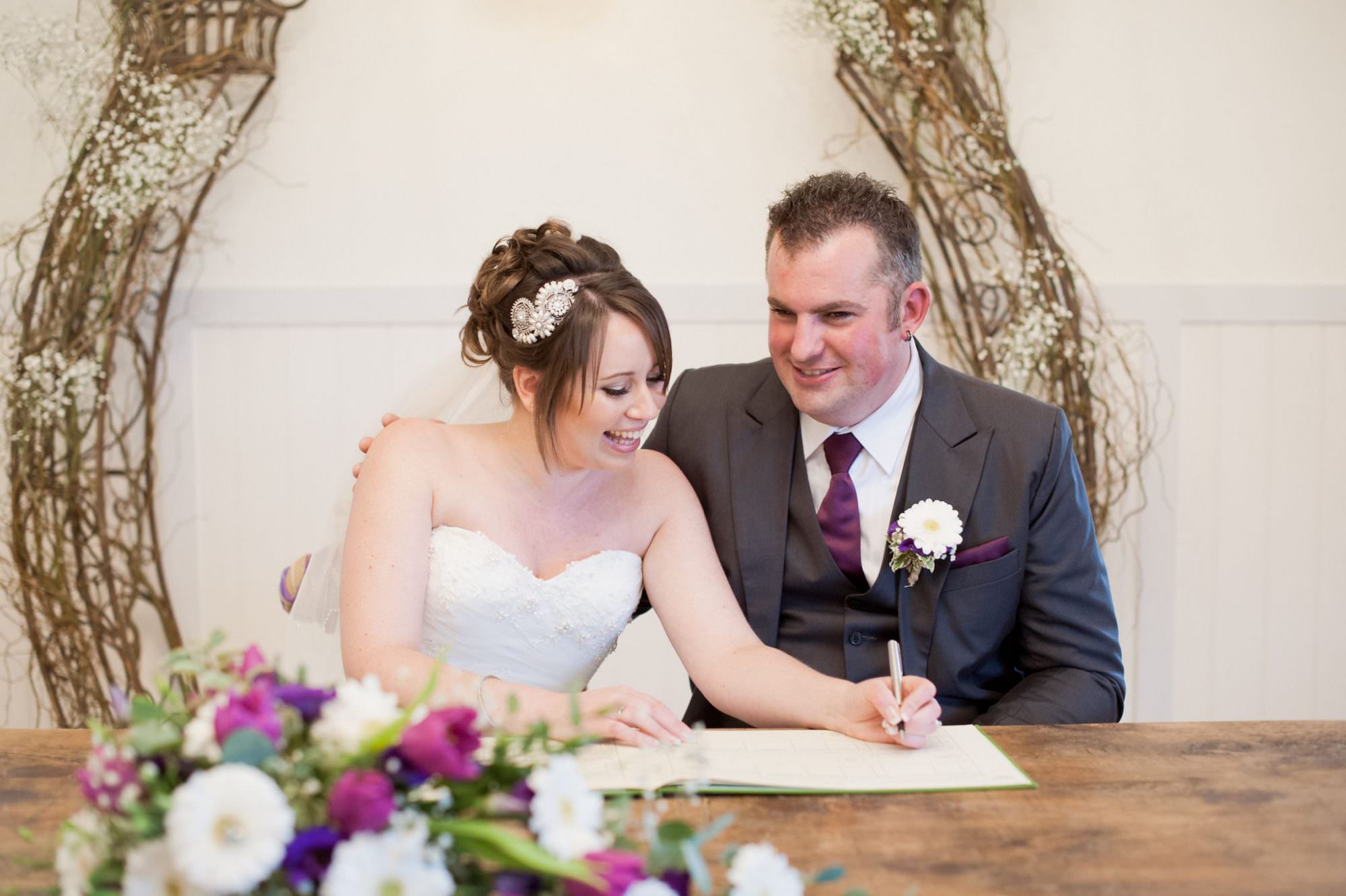 Signing the Register at Kings Arms Hotel Wedding