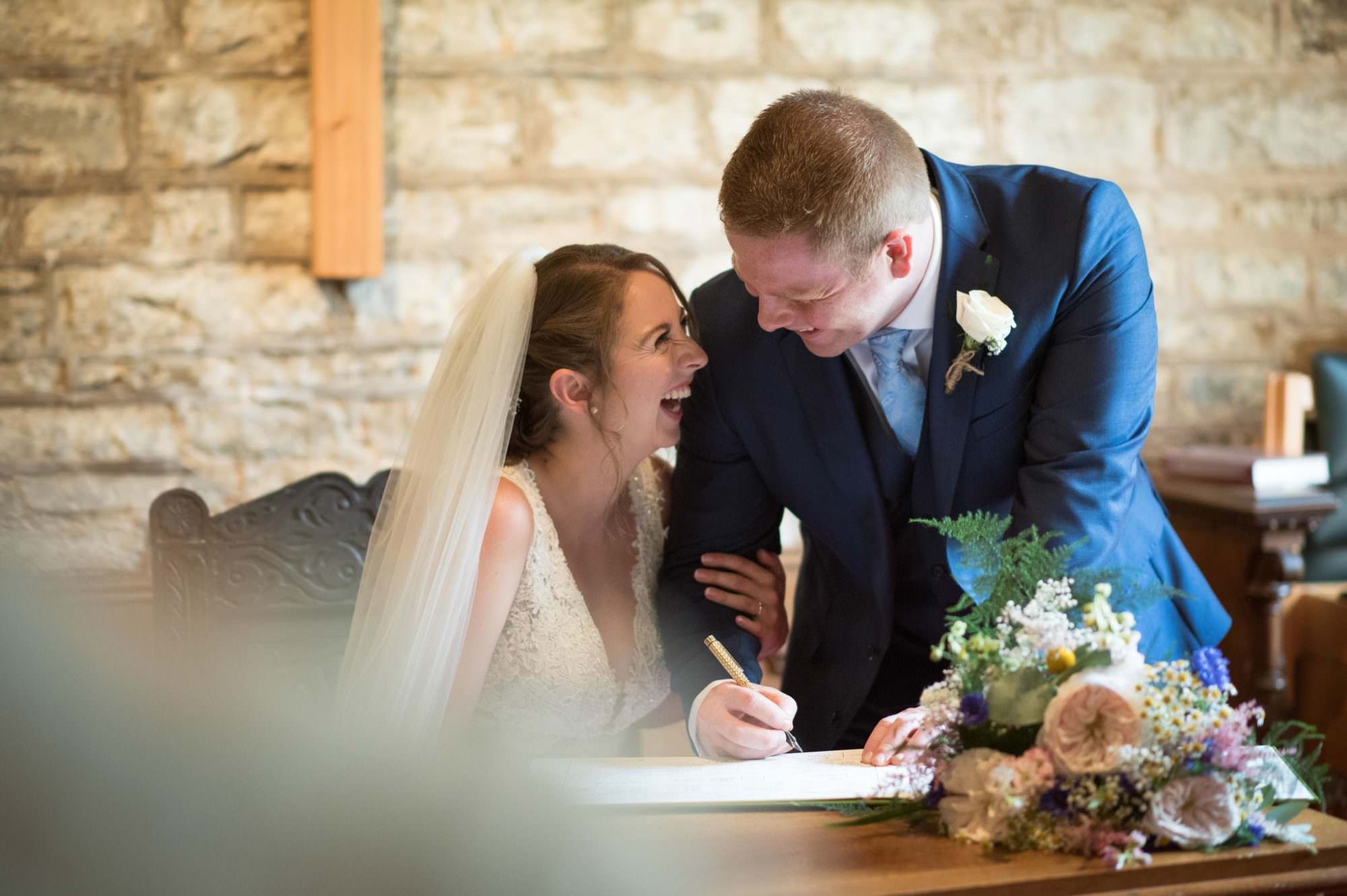 Canford magna church signing wedding register
