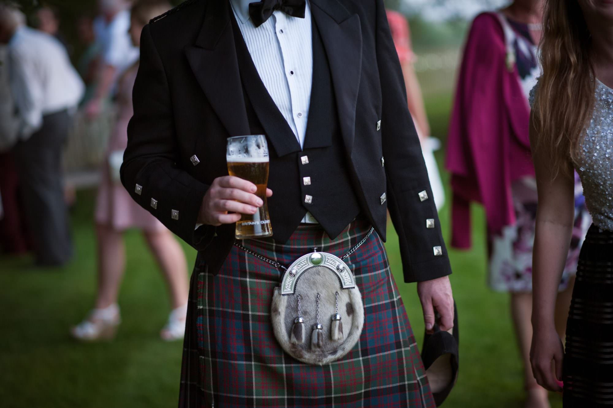 Guest wearing kilt at Dorset wedding