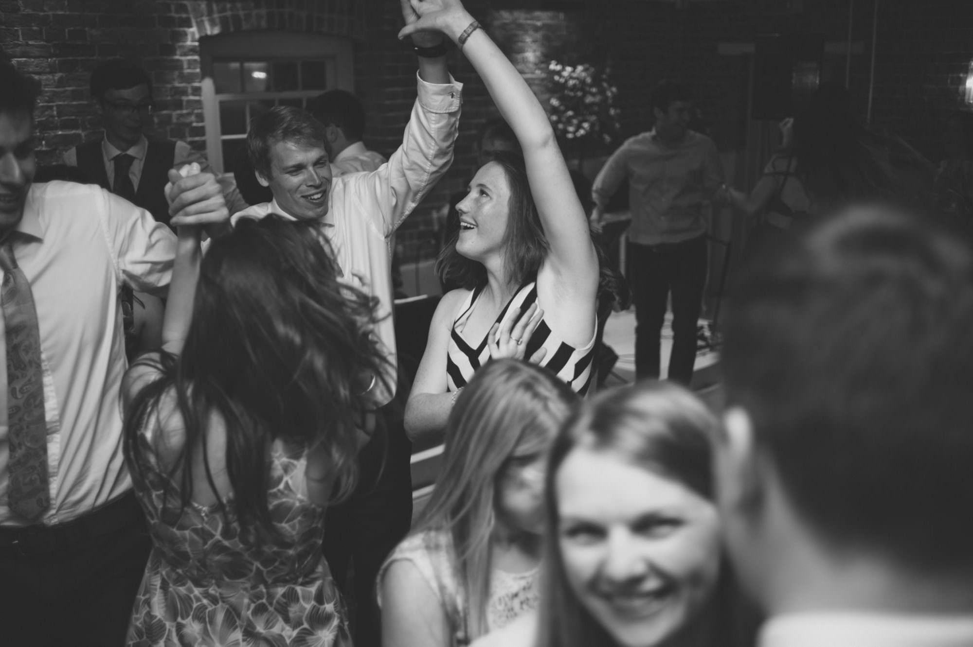 Guests dancing at Sopley Mill wedding