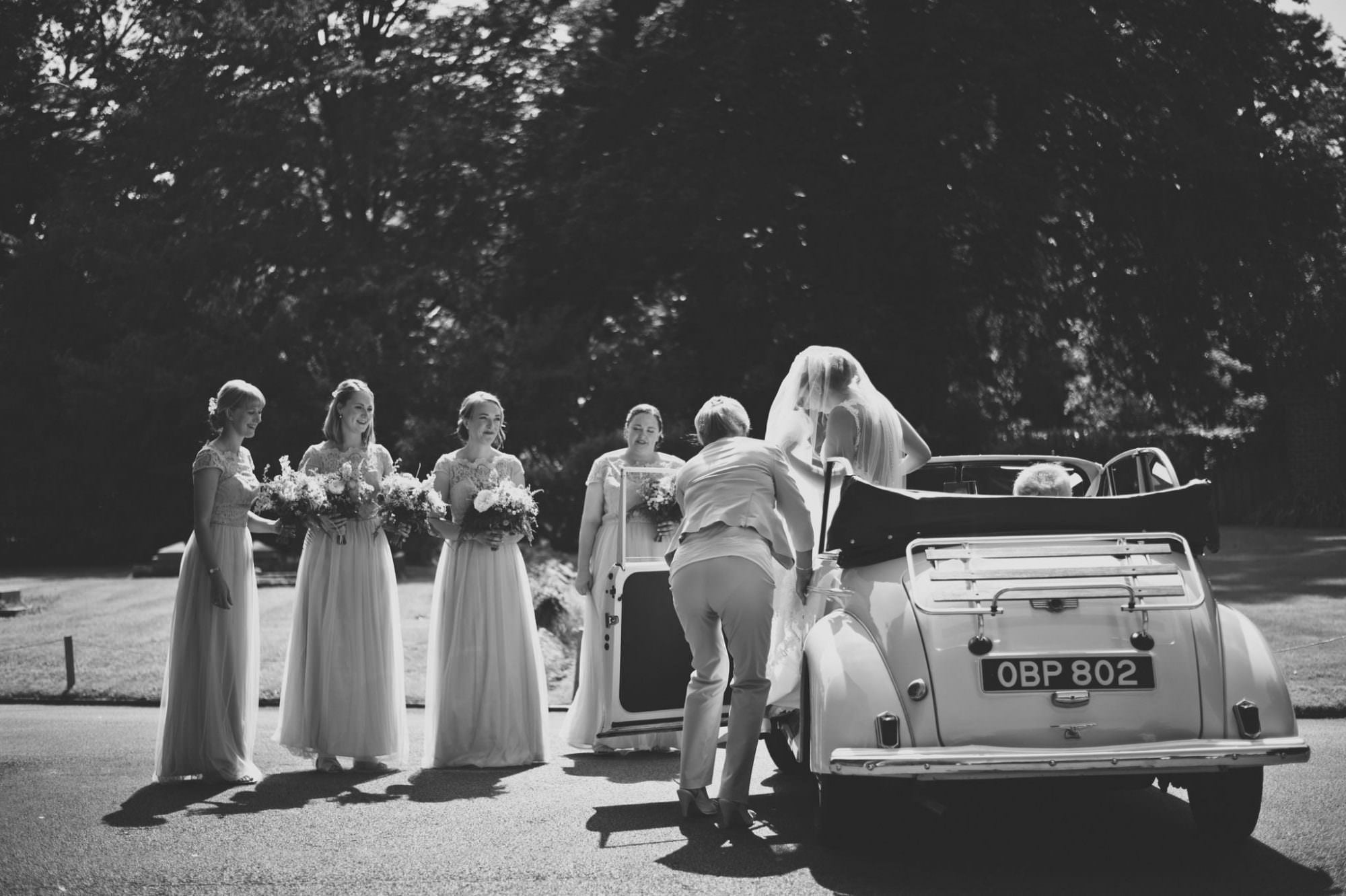 Dorset bride arriving at Canford Magna Church wedding