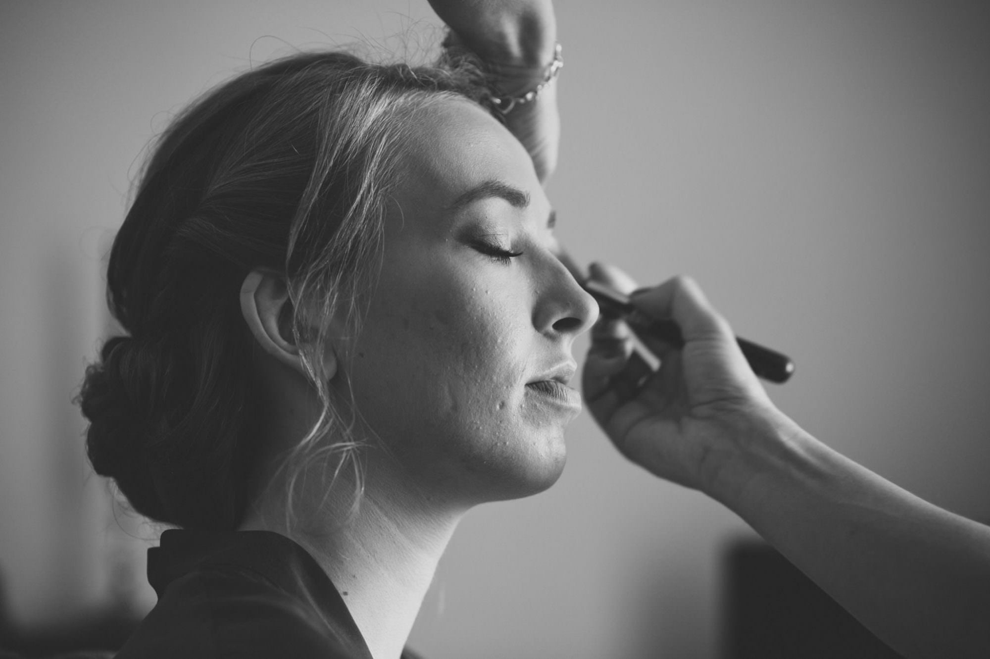 Bridesmaids makeup captured by Canford Magna Church wedding photographer