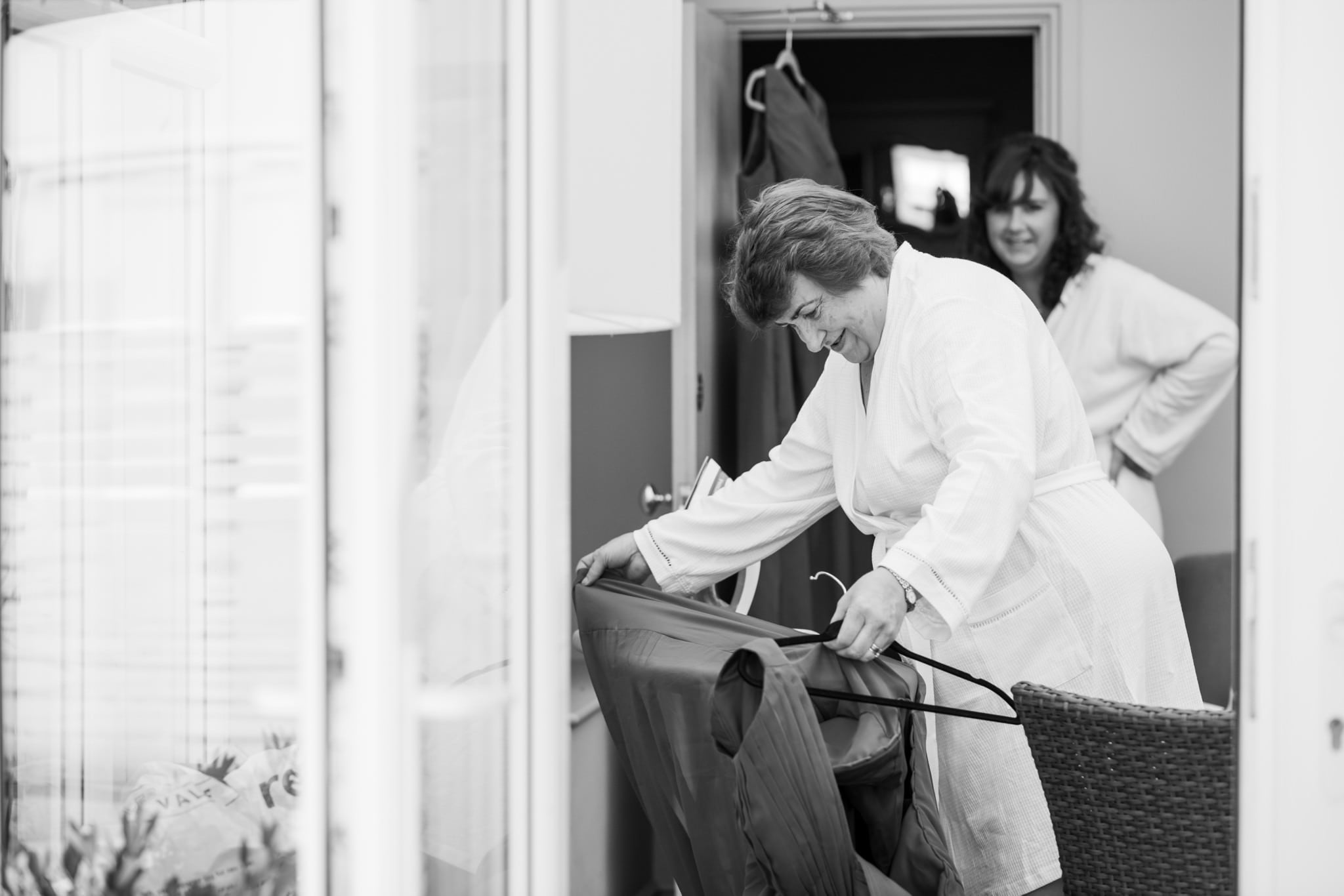 Mother of the bride ironing at Gordleton Mill