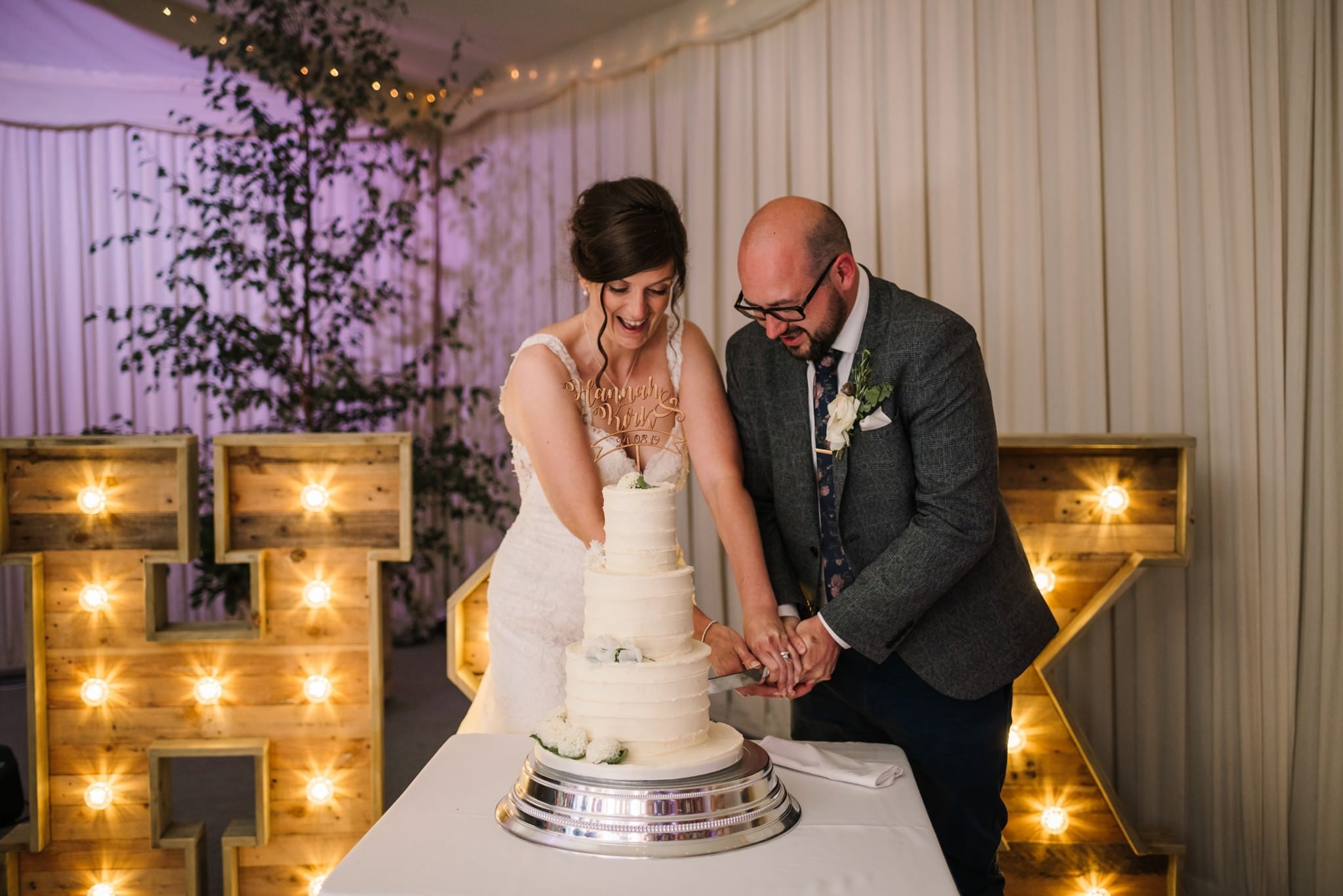 Cutting the cake at Gordleton Mill Wedding Photography